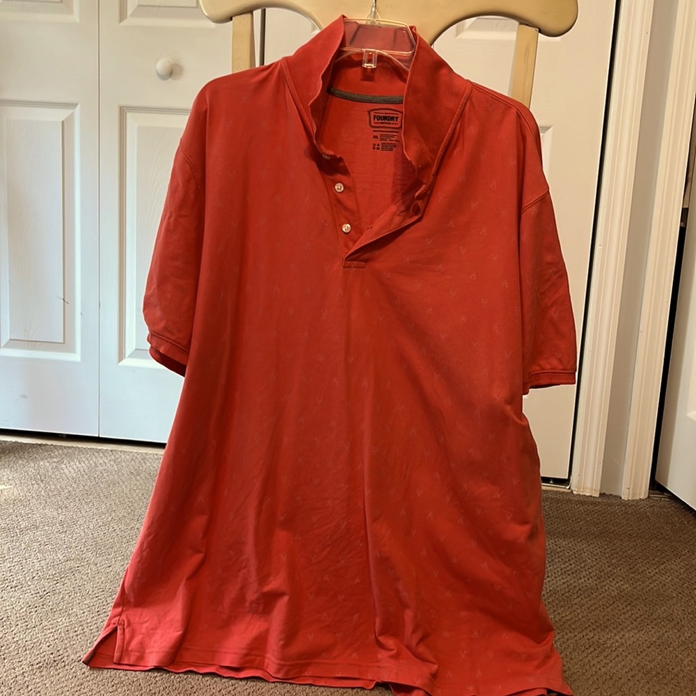 Coral/pinkish polo